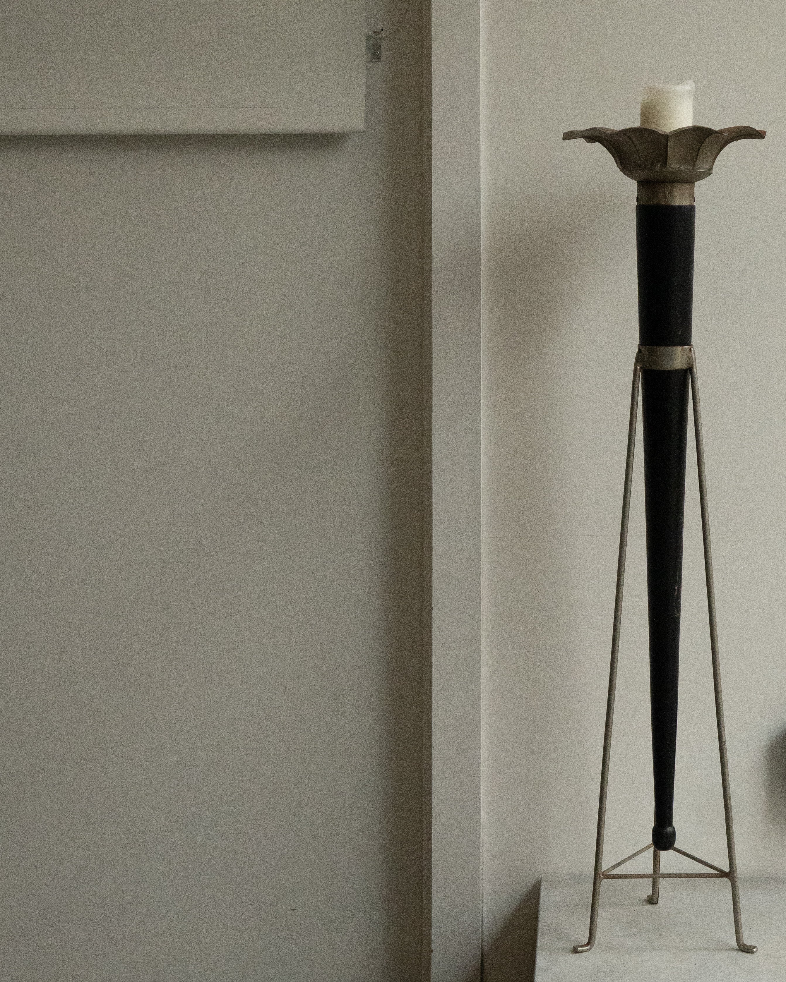 Sculptural pillar candle holder