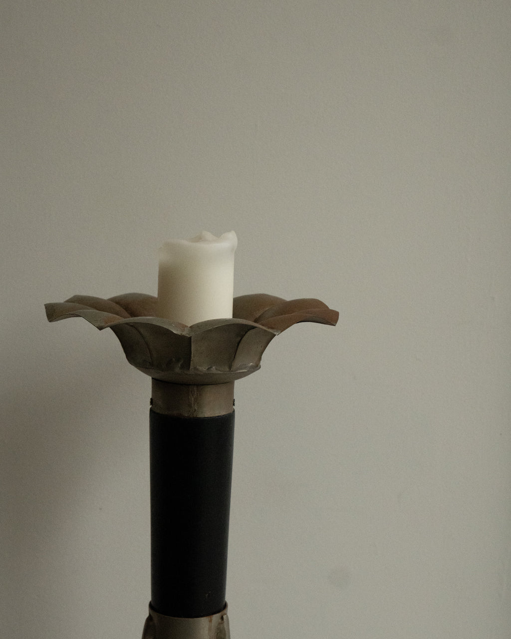 Sculptural pillar candle holder