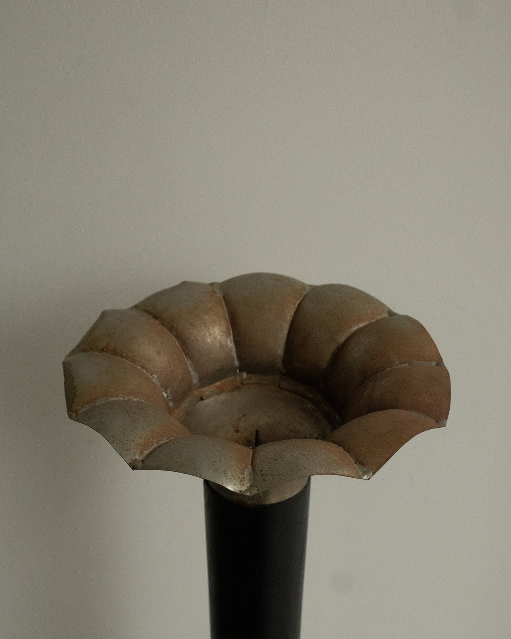 Sculptural pillar candle holder