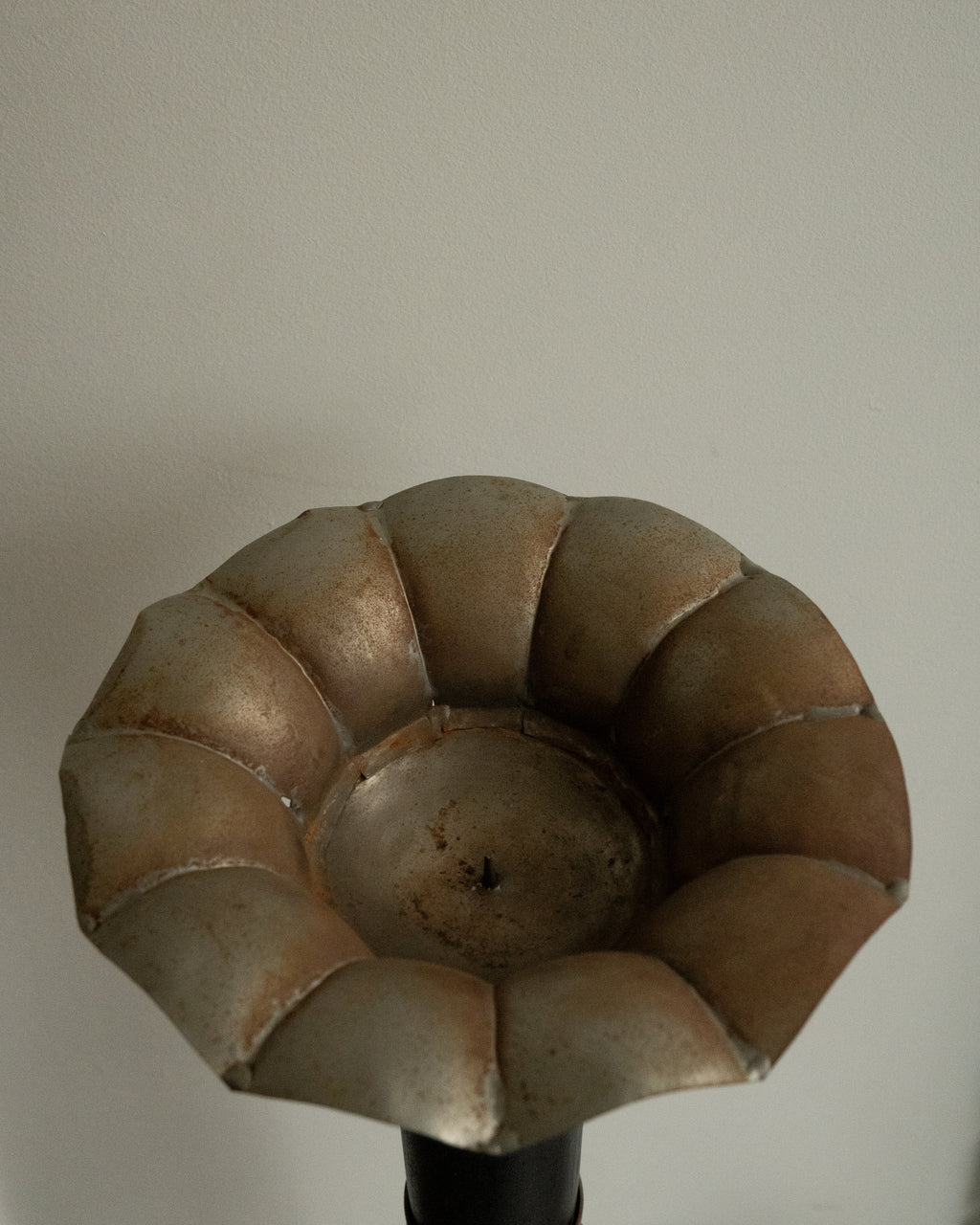 Sculptural pillar candle holder