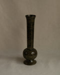 Green stained wooden vessel