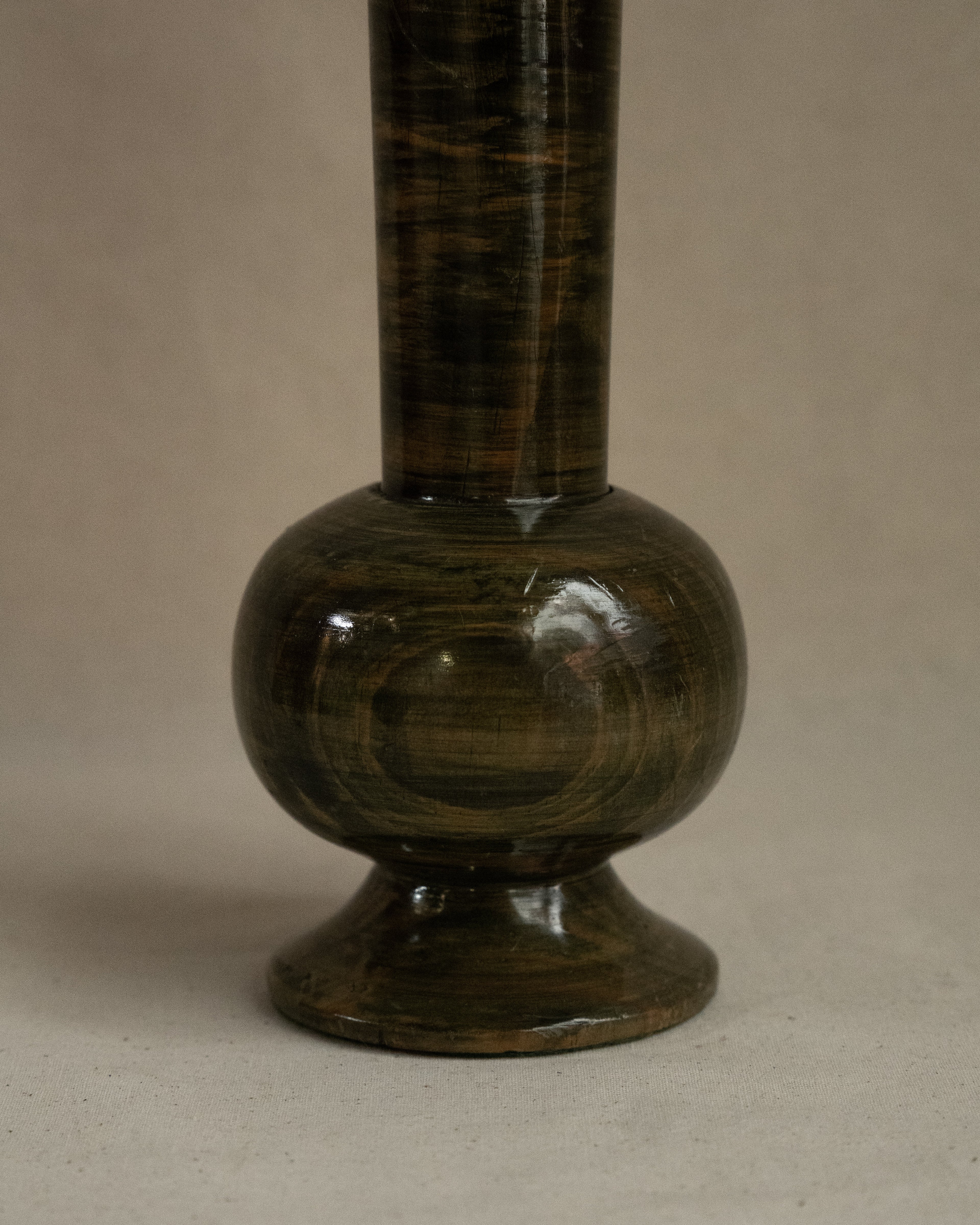 Green stained wooden vessel