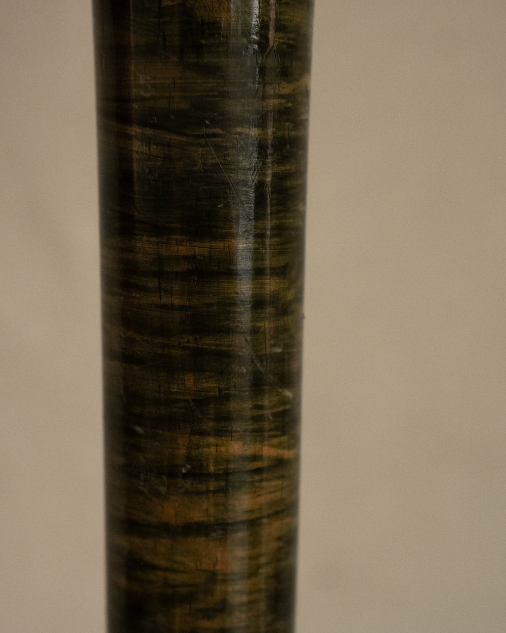 Green stained wooden vessel