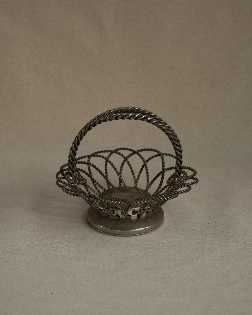 Silver plated basket with rope design handles