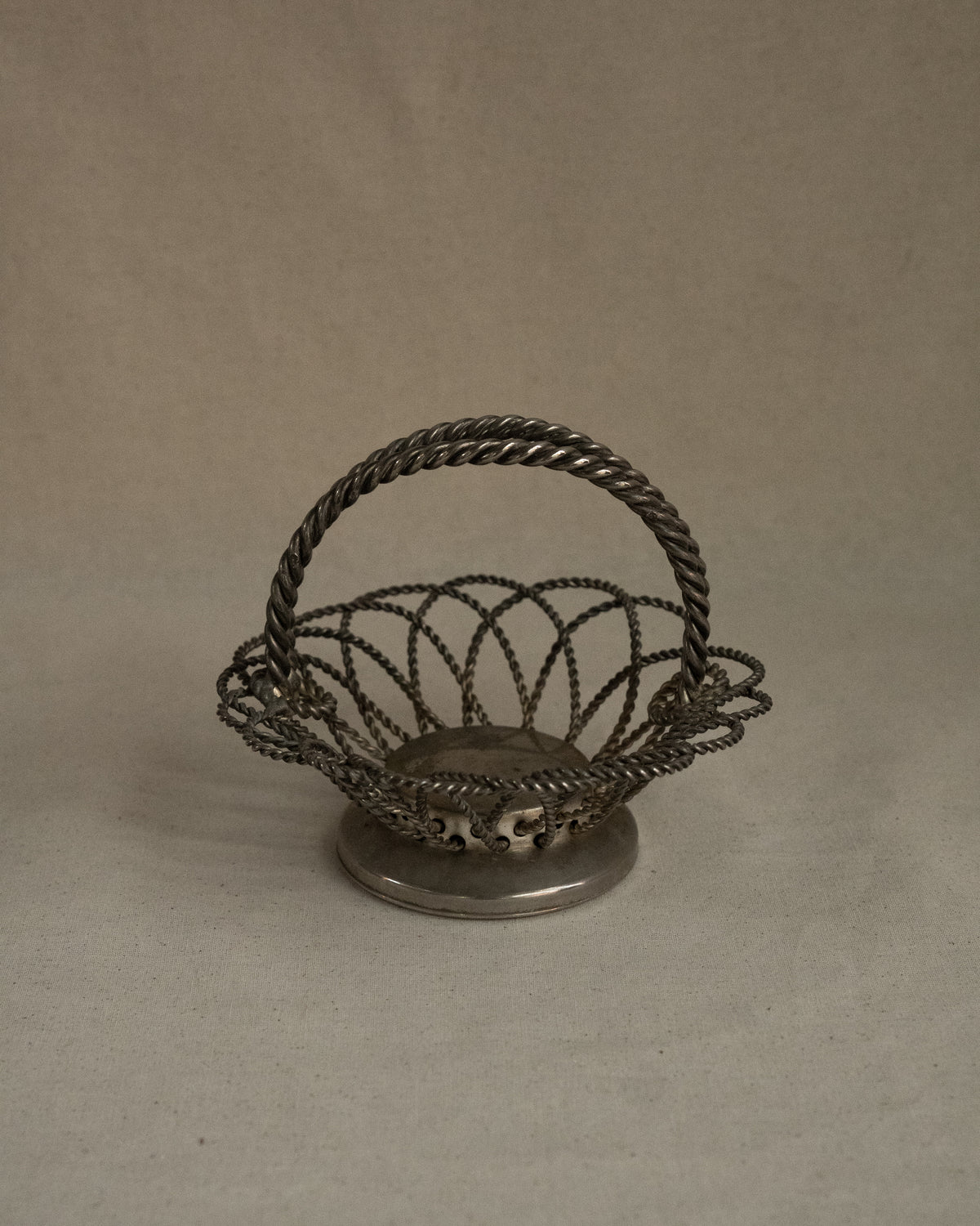 Silver plated basket with rope design handles