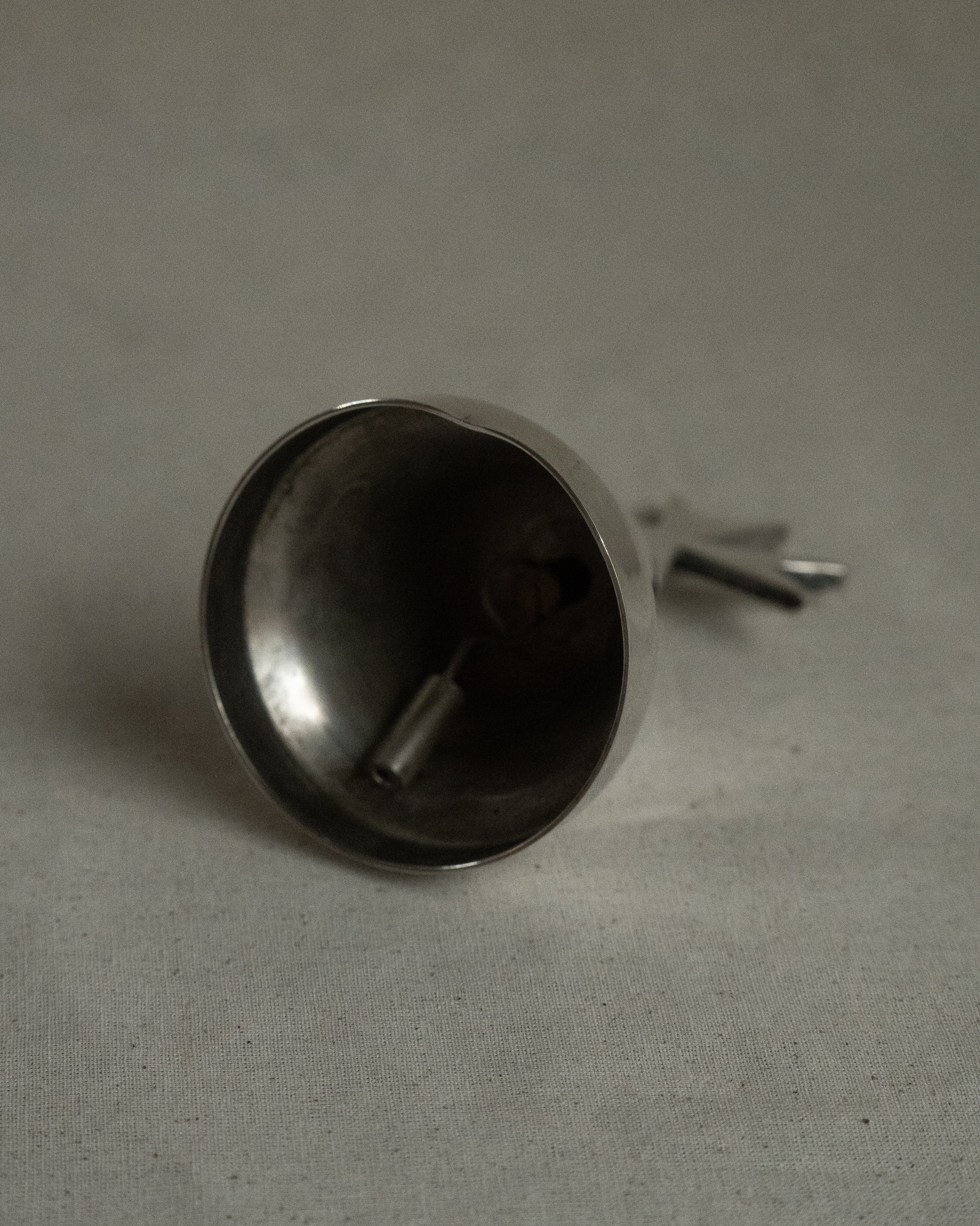 Silver plated bell with cross