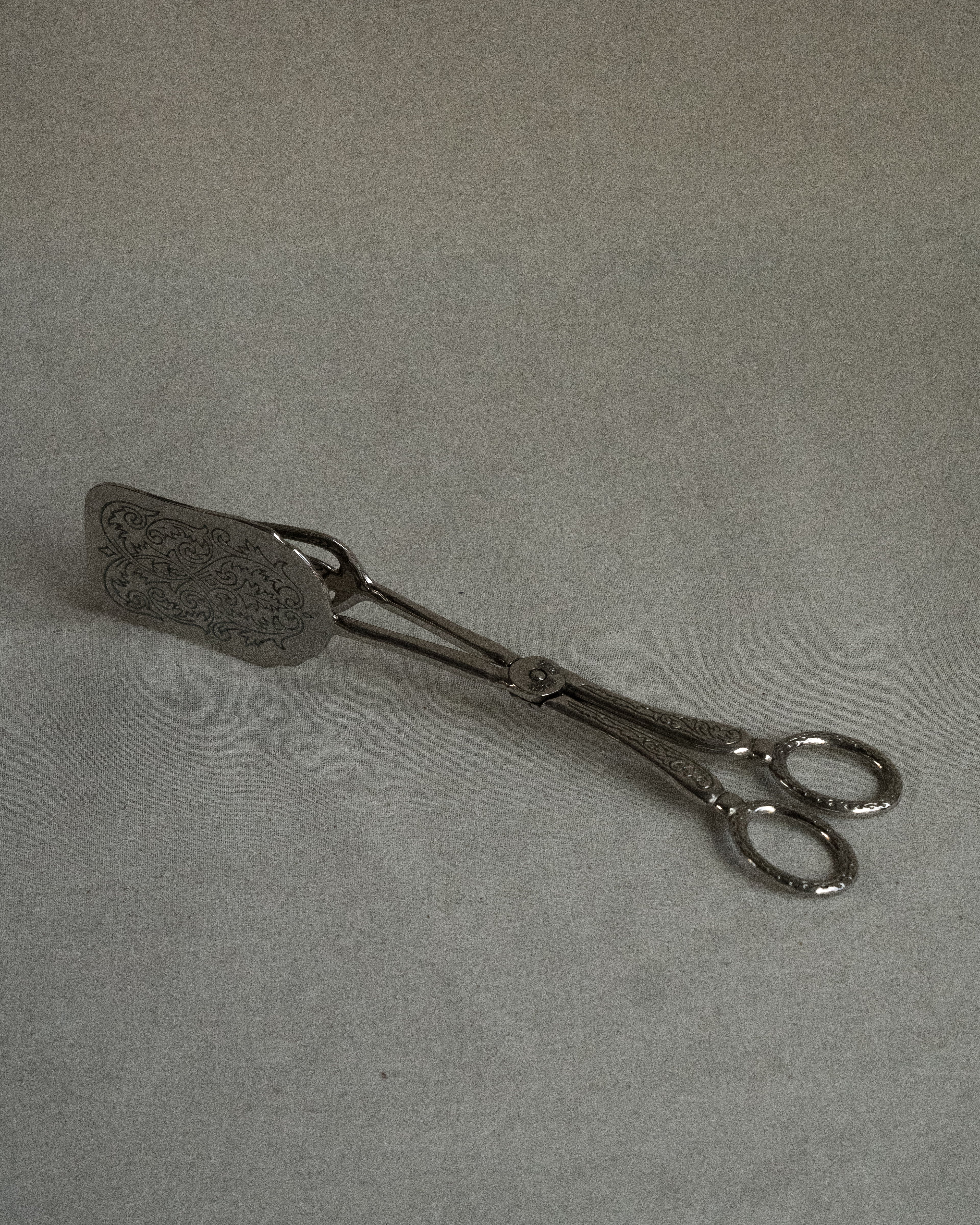 Silver plated tongs