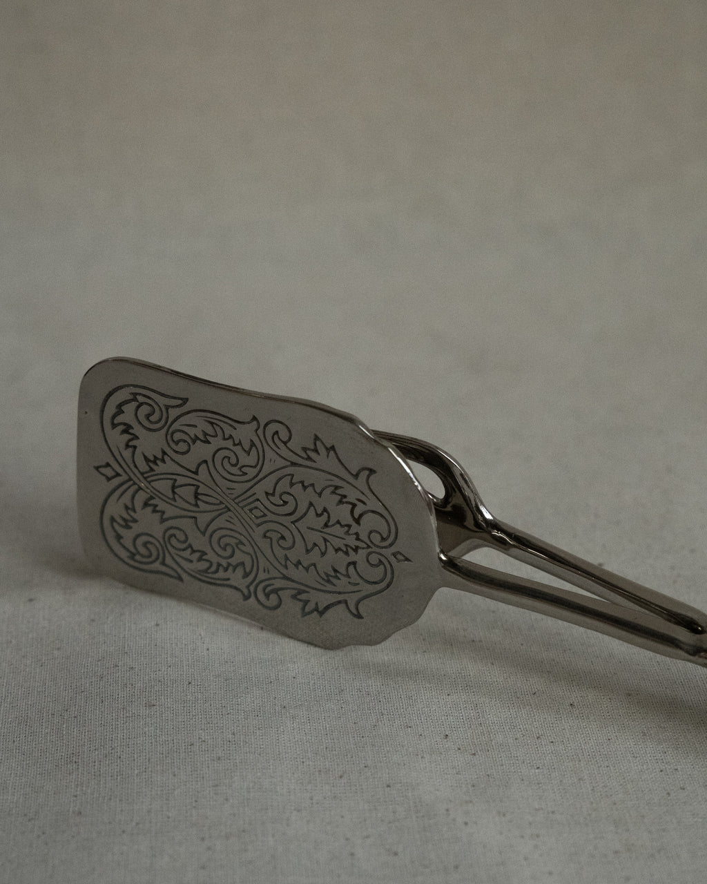 Silver plated tongs