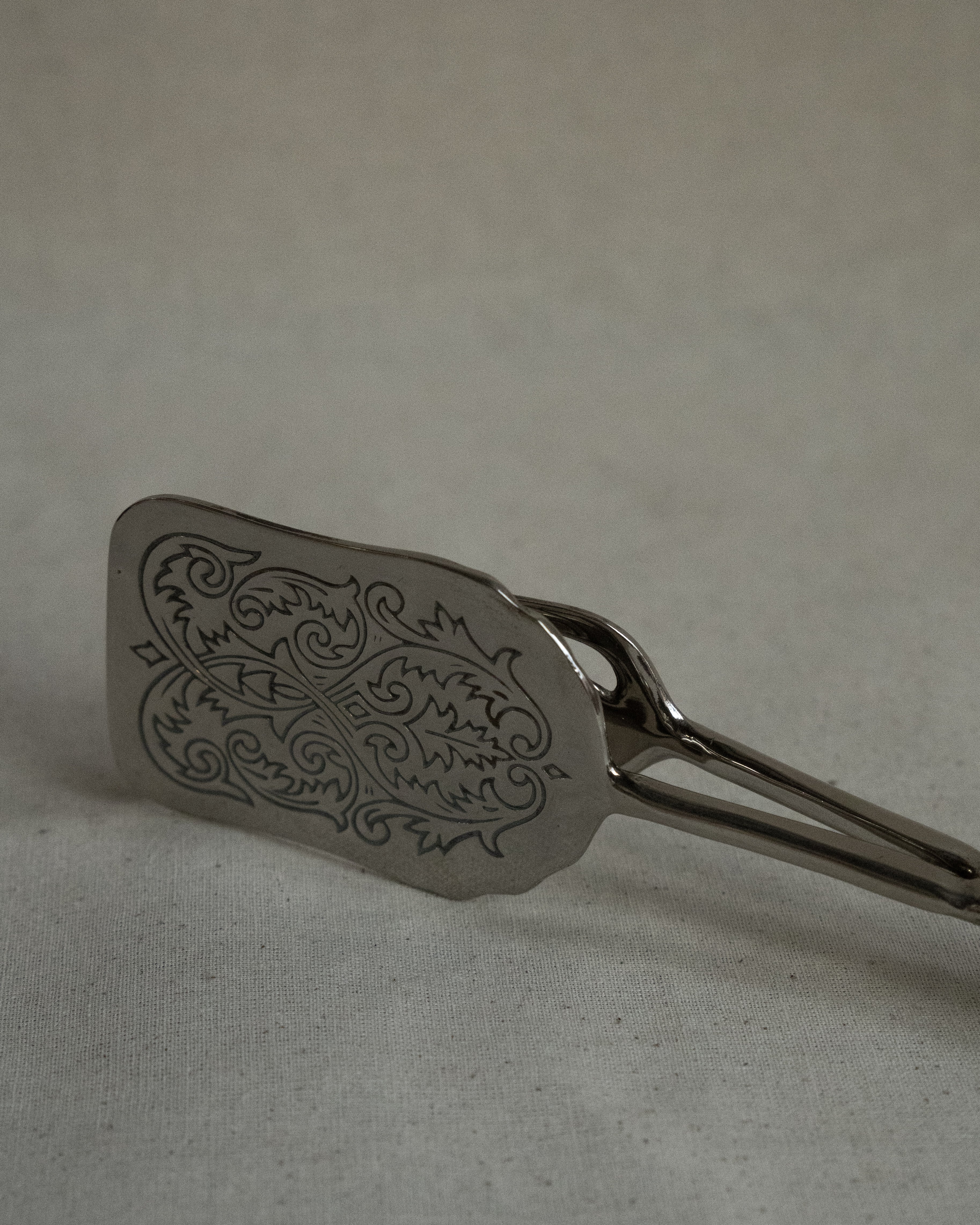 Silver plated tongs
