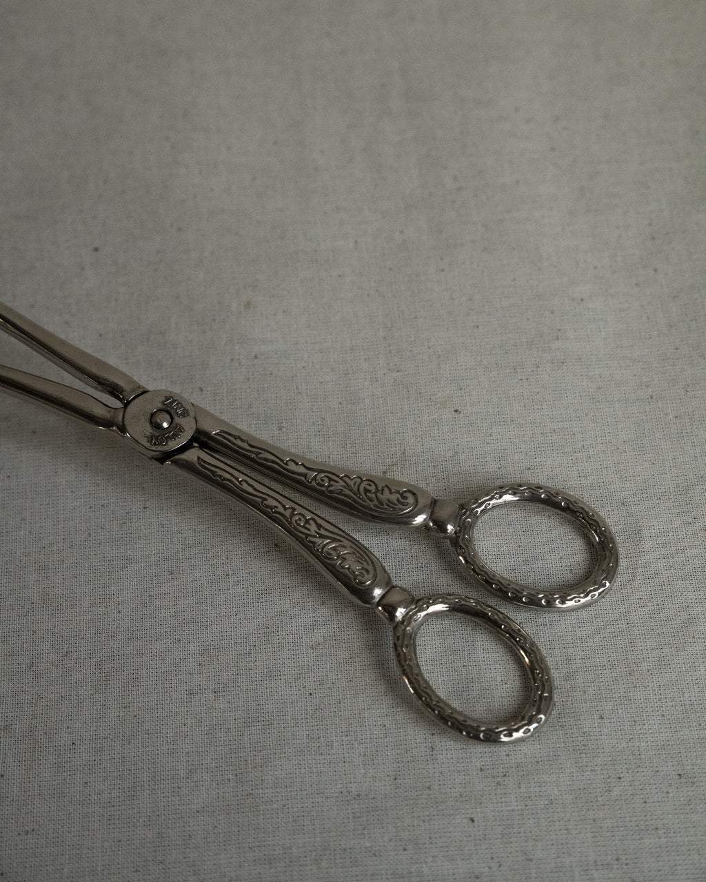 Silver plated tongs