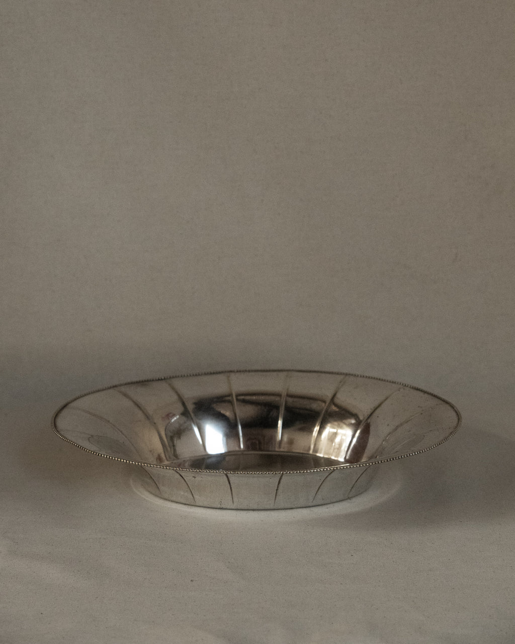 Silver plated dish with beaded edges