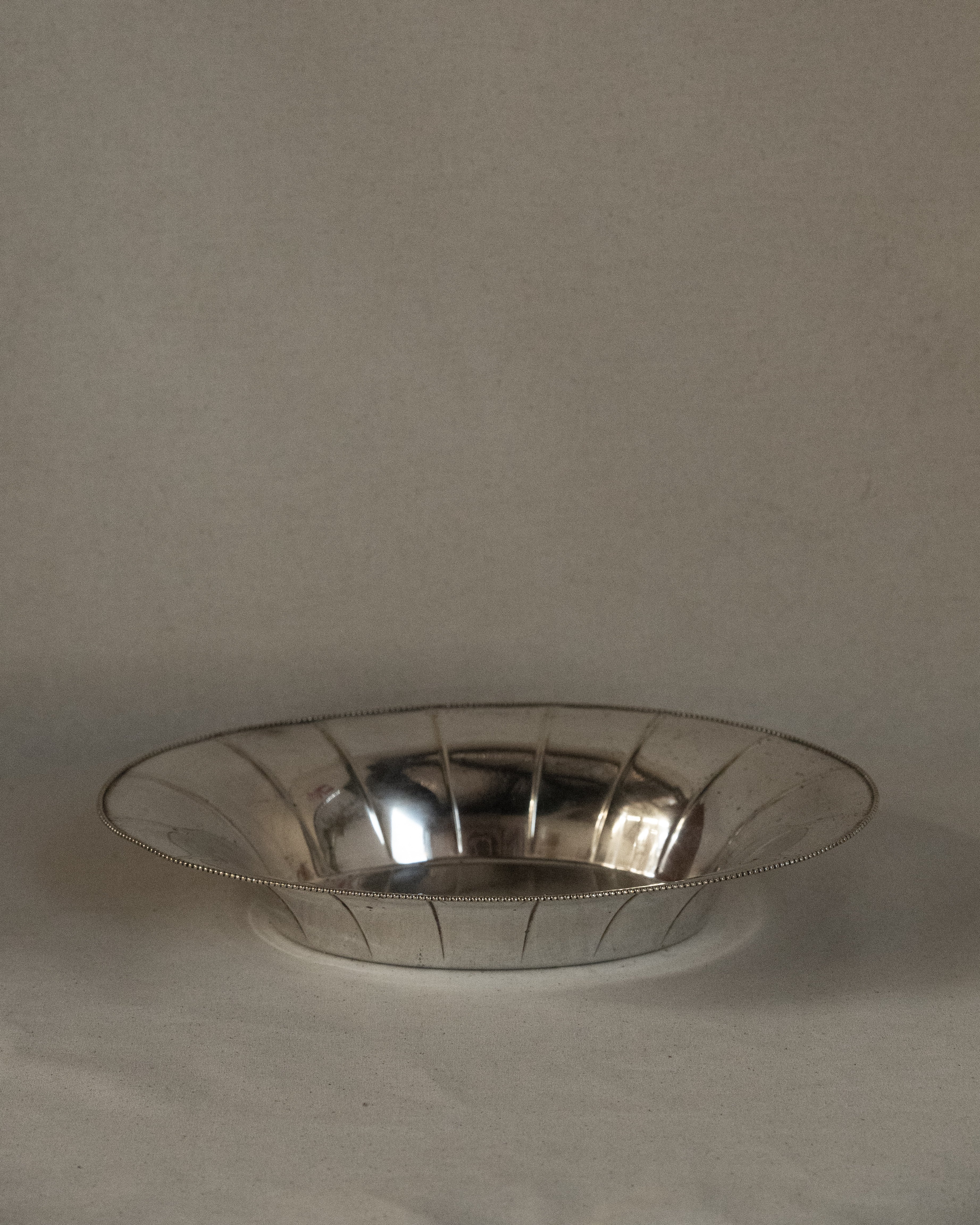 Silver plated dish with beaded edges