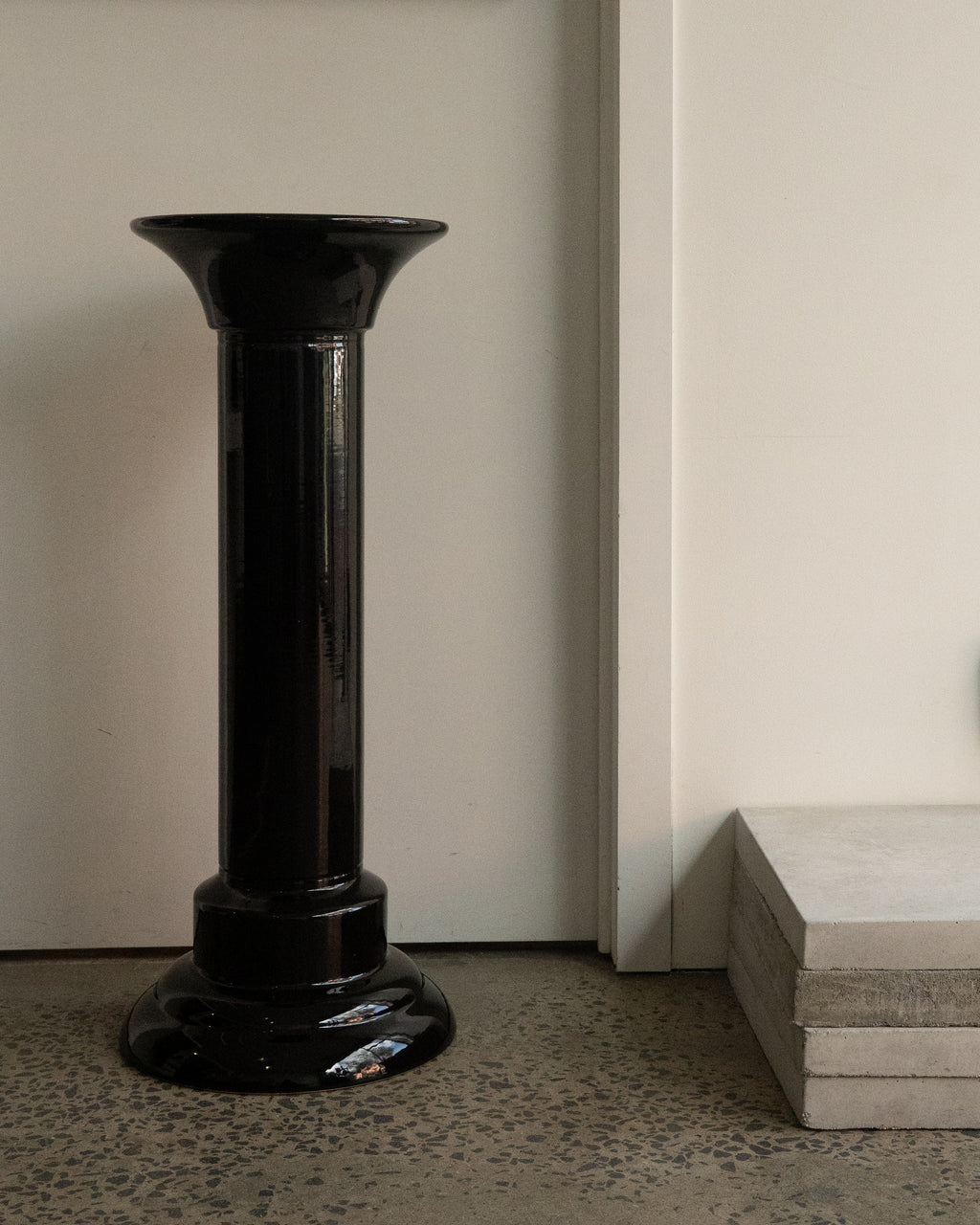 Black ceramic pedestal