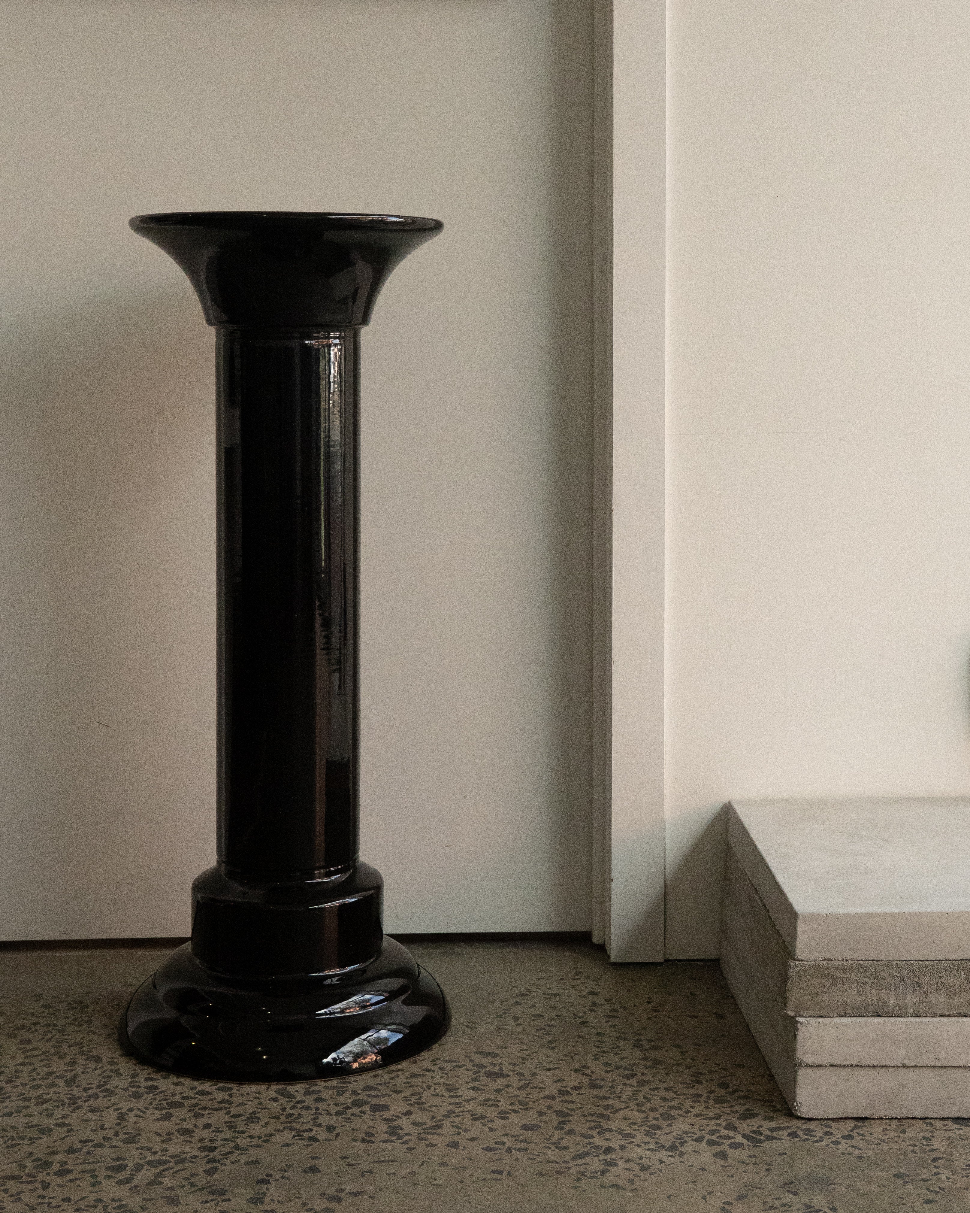 Black ceramic pedestal