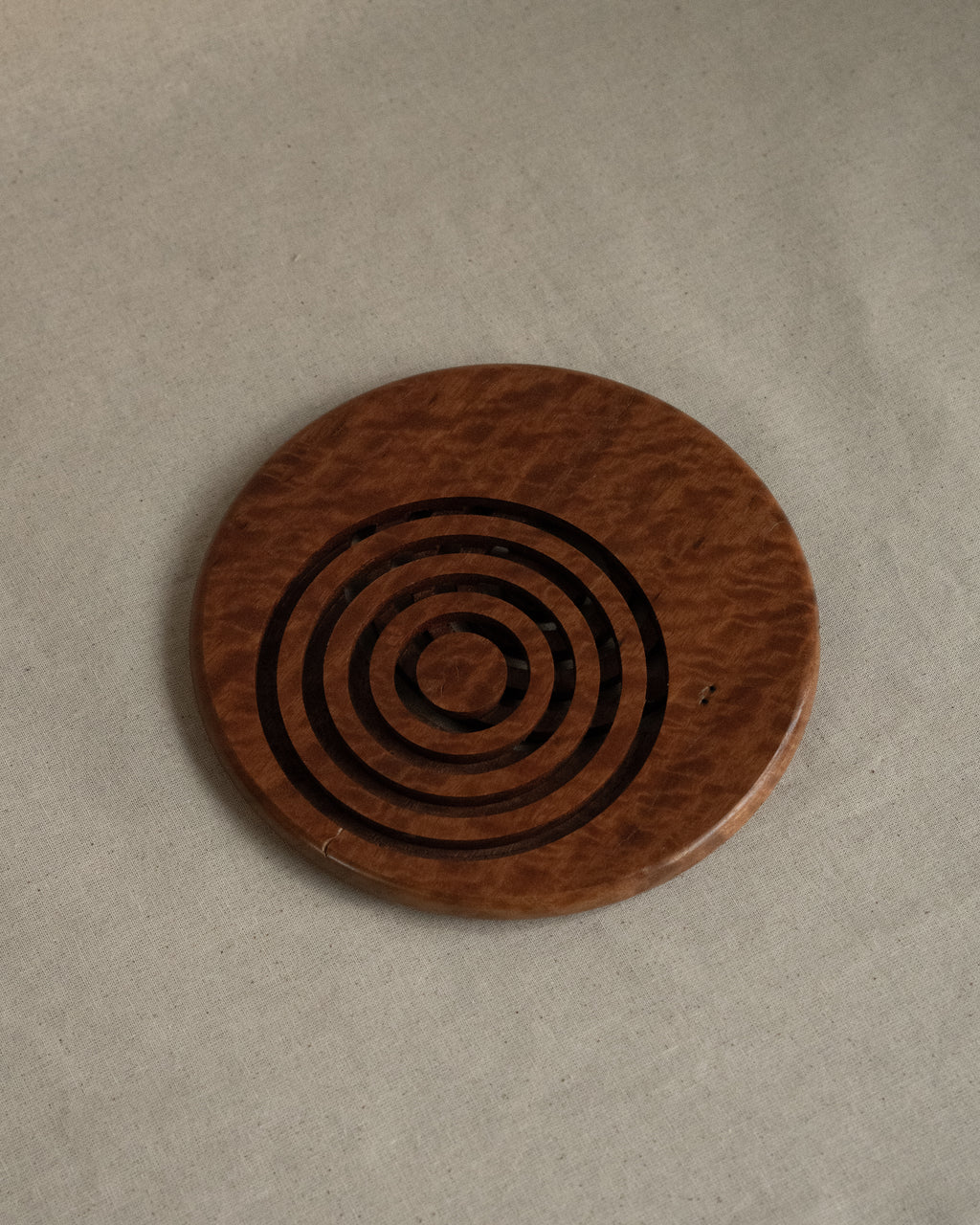 Wooden trivet with circle cut outs
