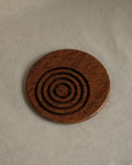 Wooden trivet with circle cut outs