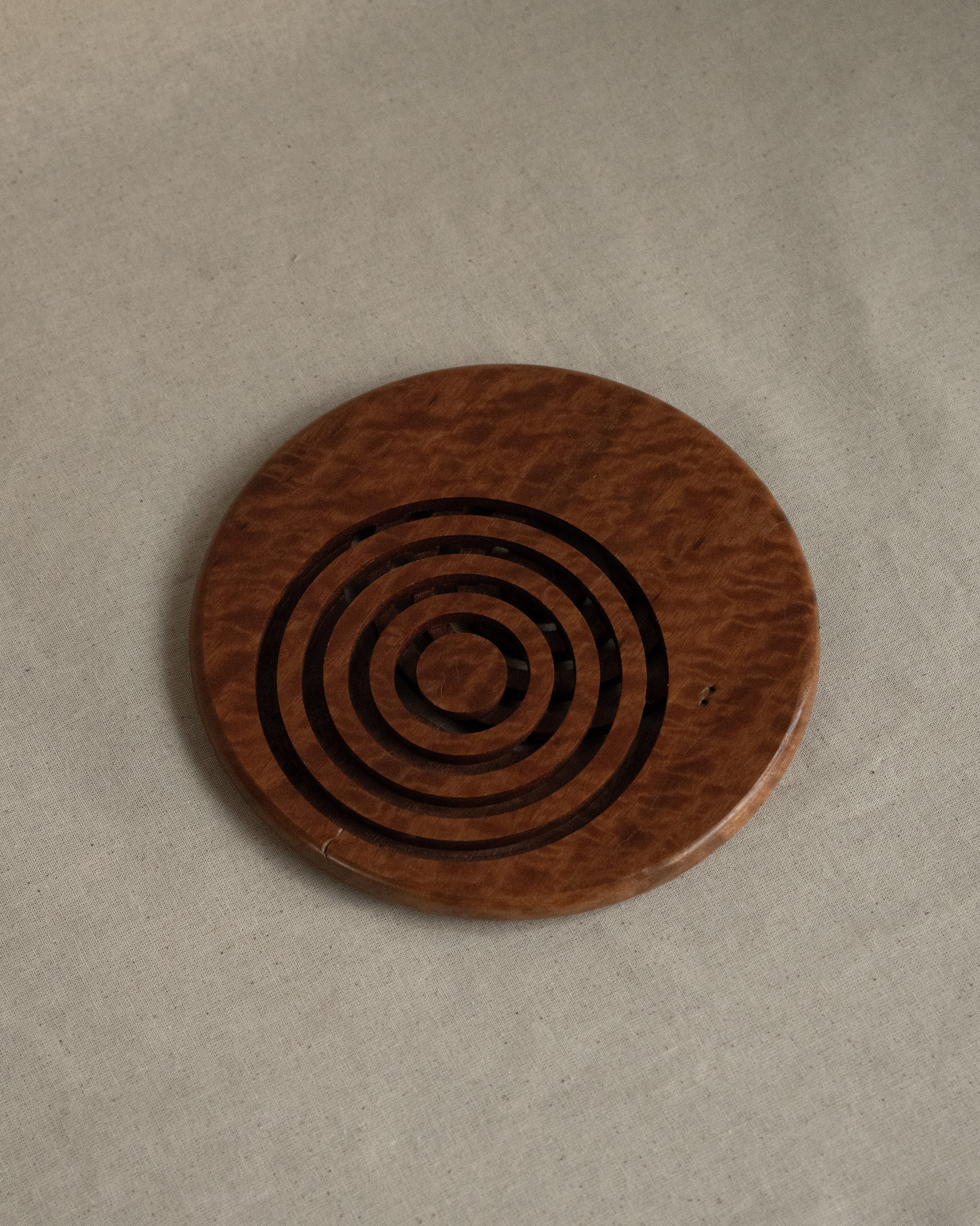 Wooden trivet with circle cut outs