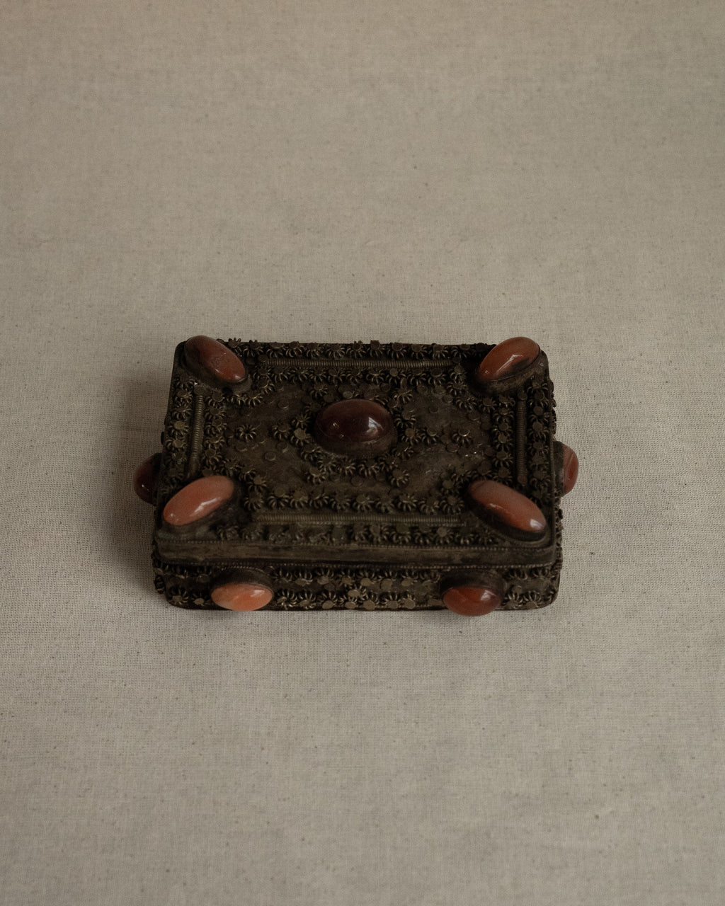 Tibetan filigree box with potentially carnelian gems