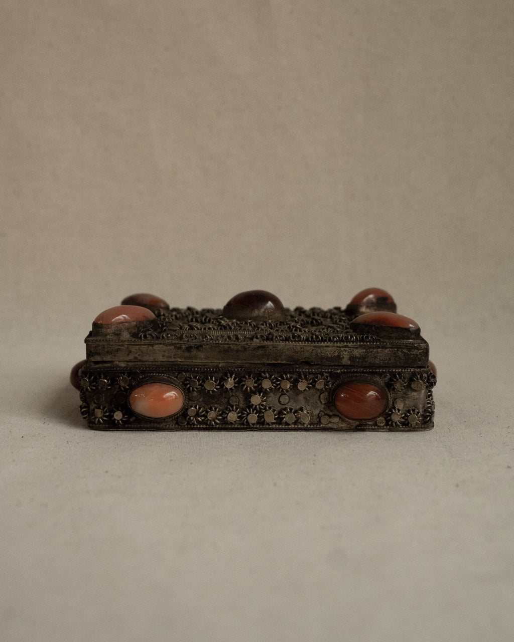 Tibetan filigree box with potentially carnelian gems