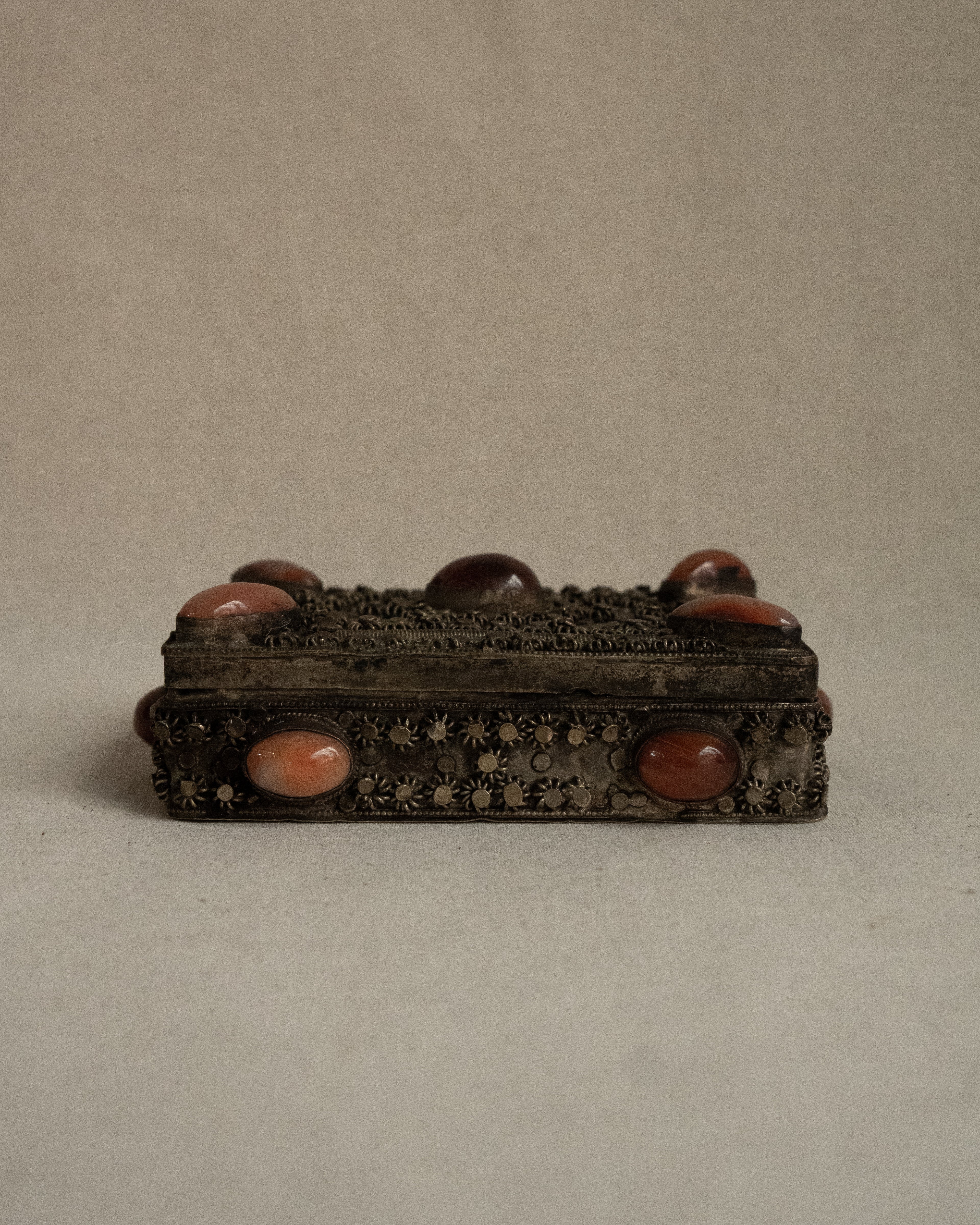 Tibetan filigree box with potentially carnelian gems