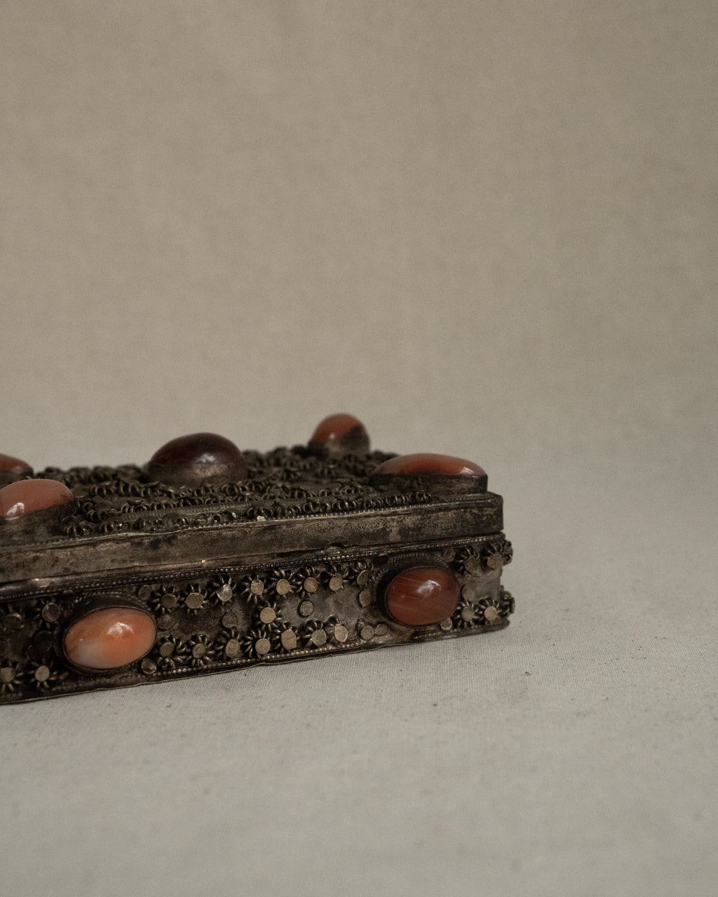 Tibetan filigree box with potentially carnelian gems