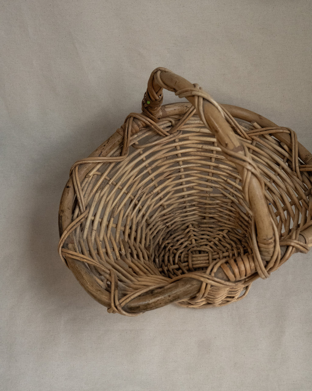 Woven basket with handle