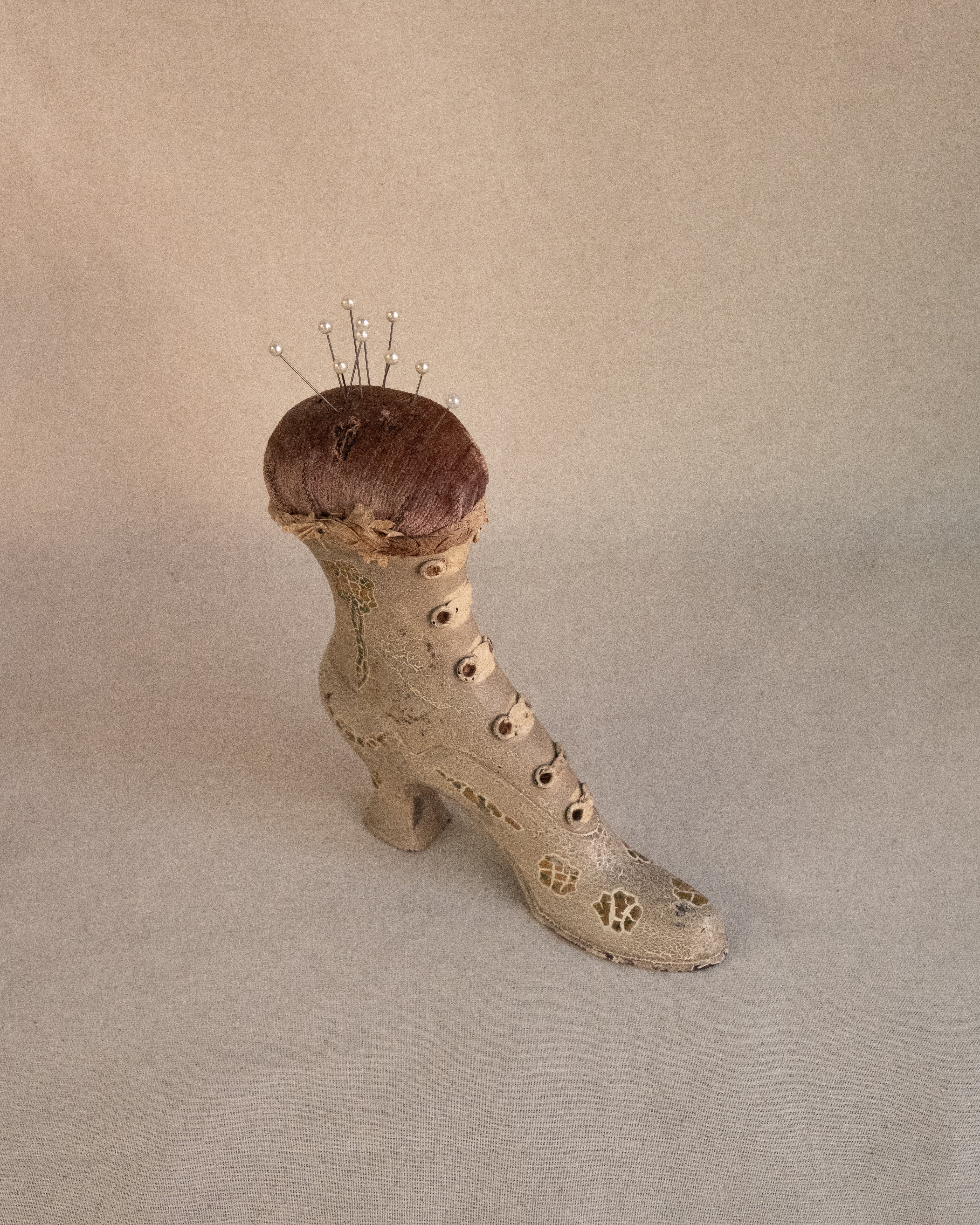 Early 20th century wooden heeled boot pin cushion