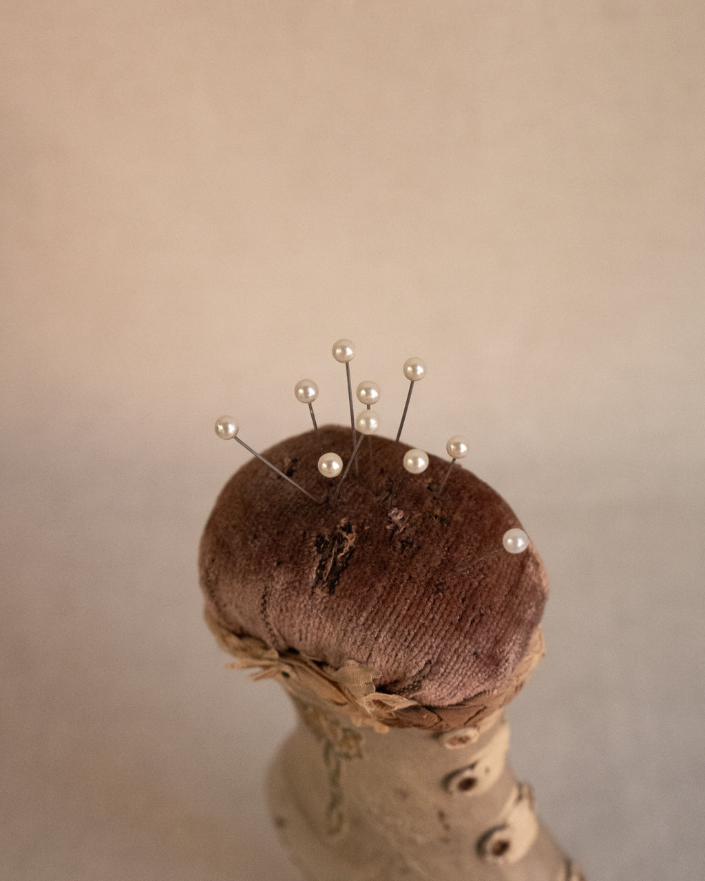 Early 20th century wooden heeled boot pin cushion