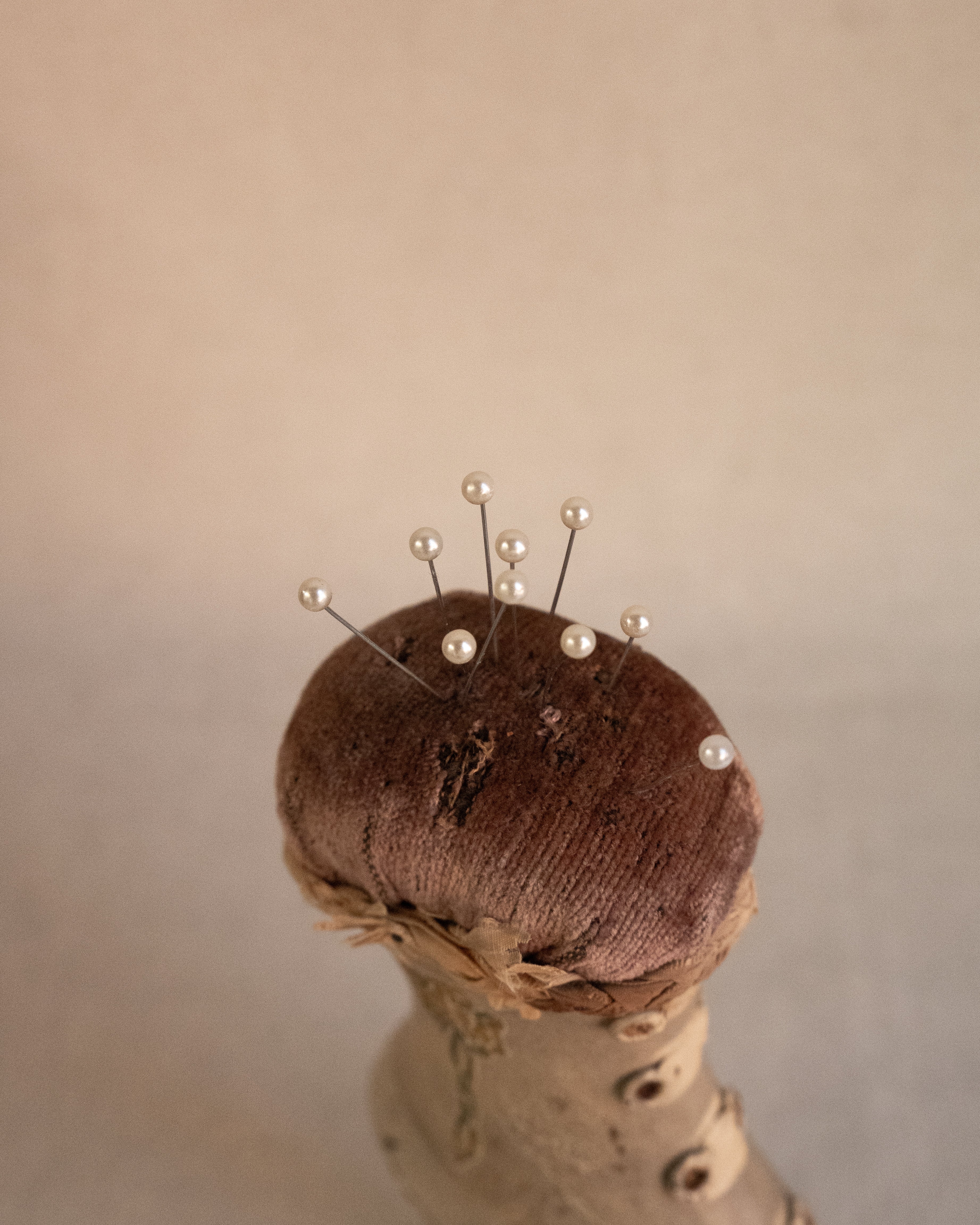 Early 20th century wooden heeled boot pin cushion