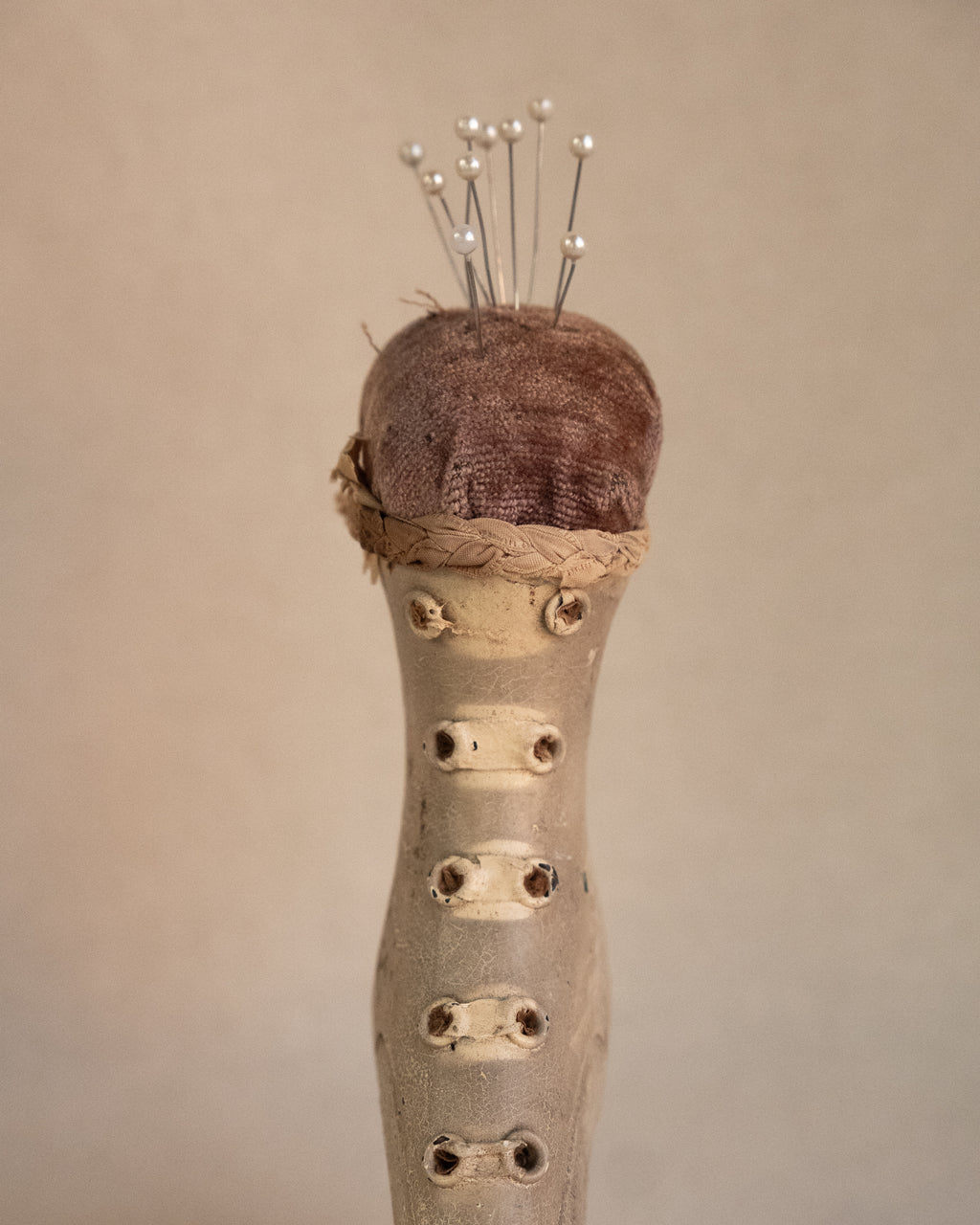 Early 20th century wooden heeled boot pin cushion