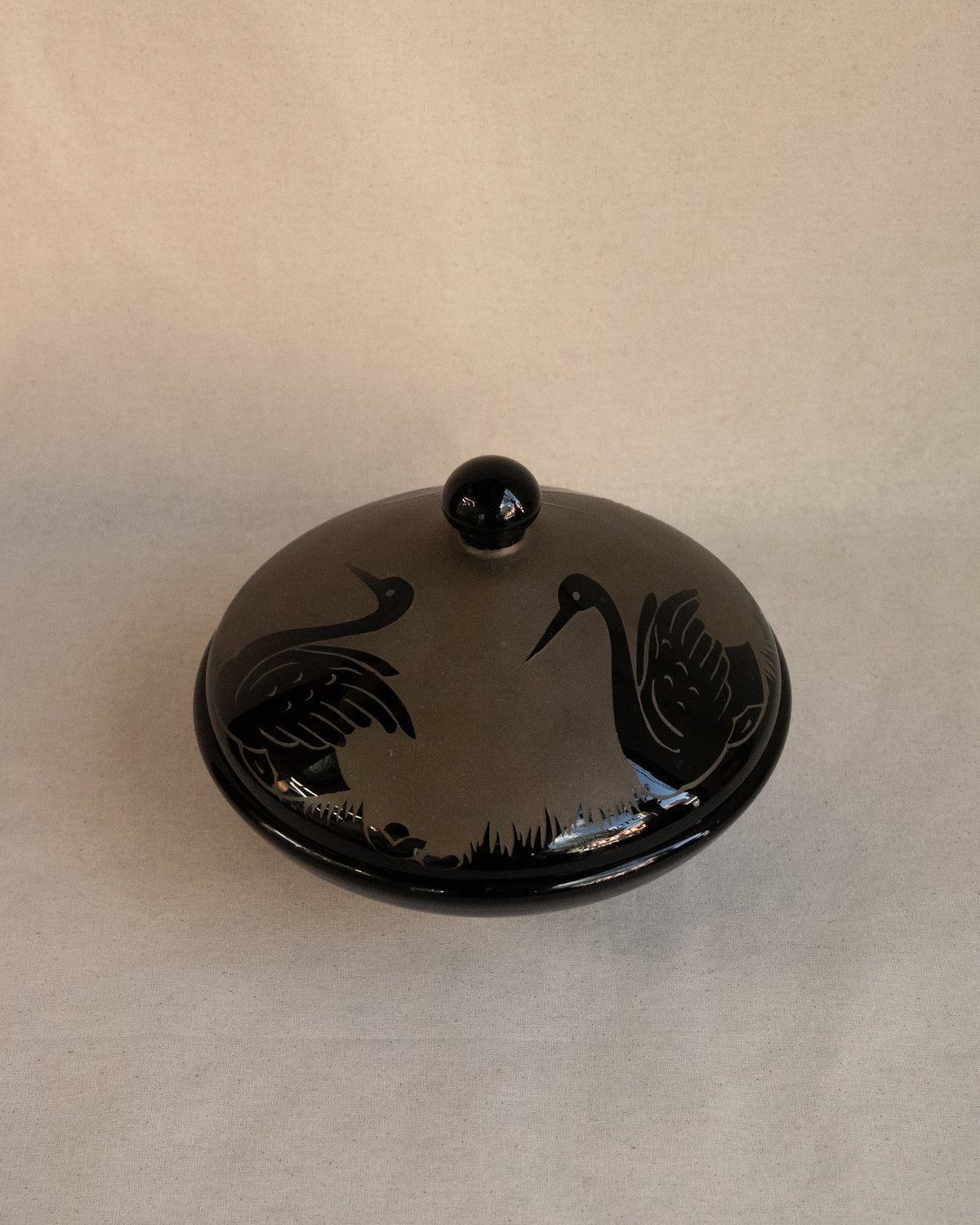 Etched black glass covered bowl with three swans in art nouveau style