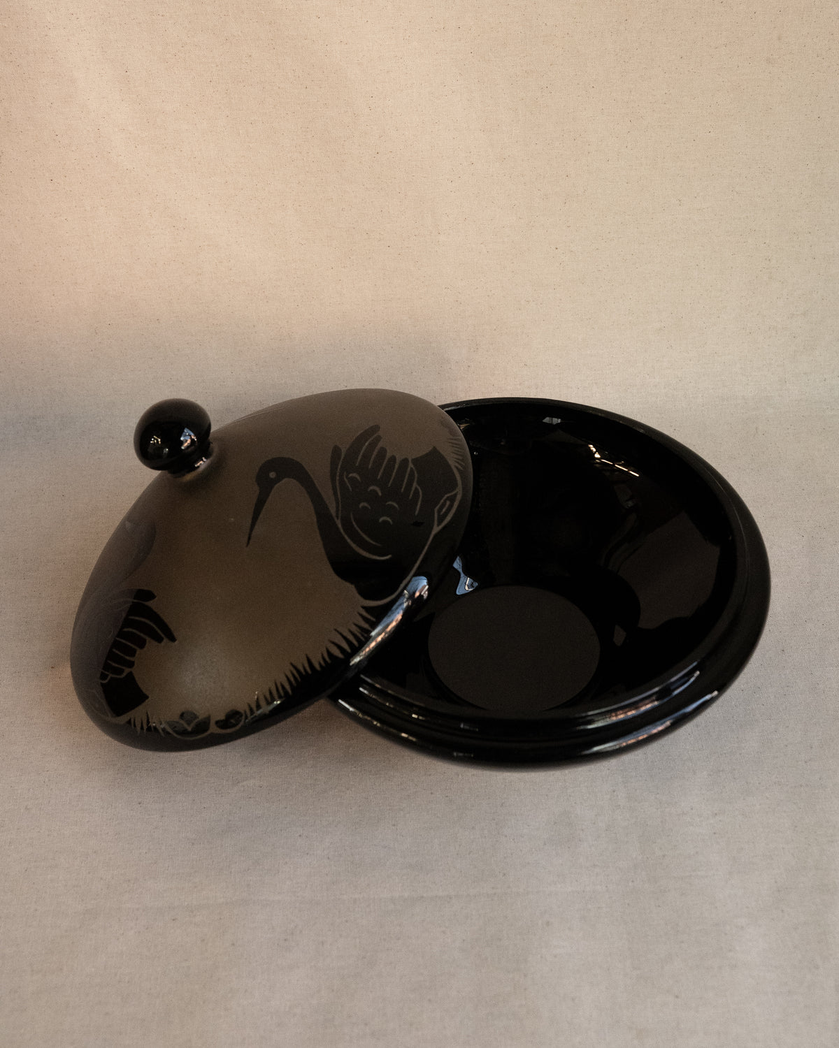 Etched black glass covered bowl with three swans in art nouveau style