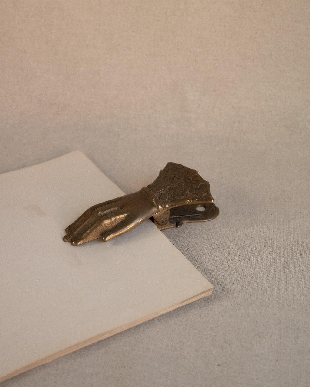 Brass hand clip