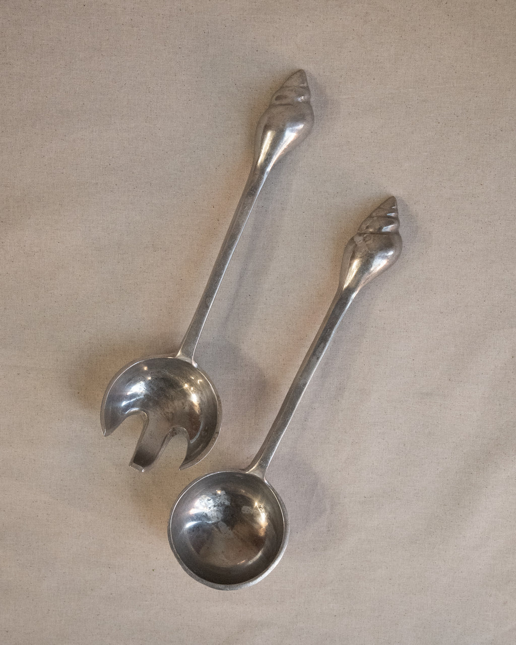Aluminum salad servers with shell handles