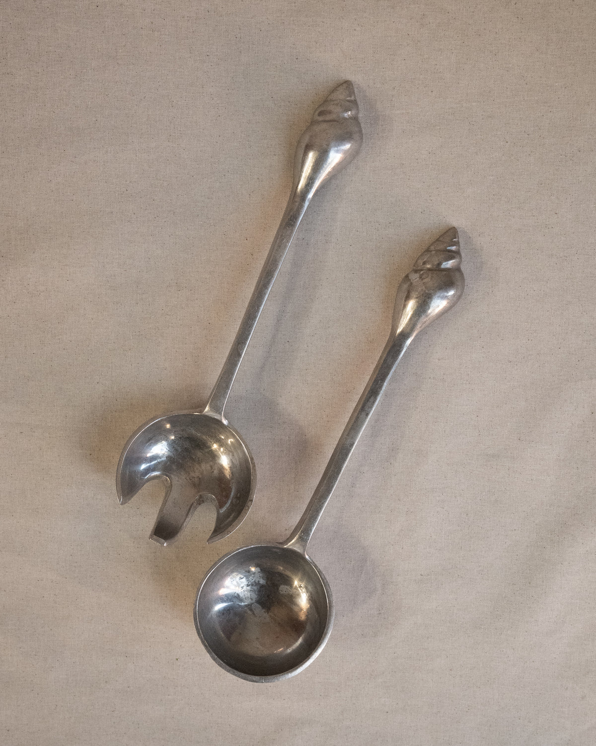 Aluminum salad servers with shell handles