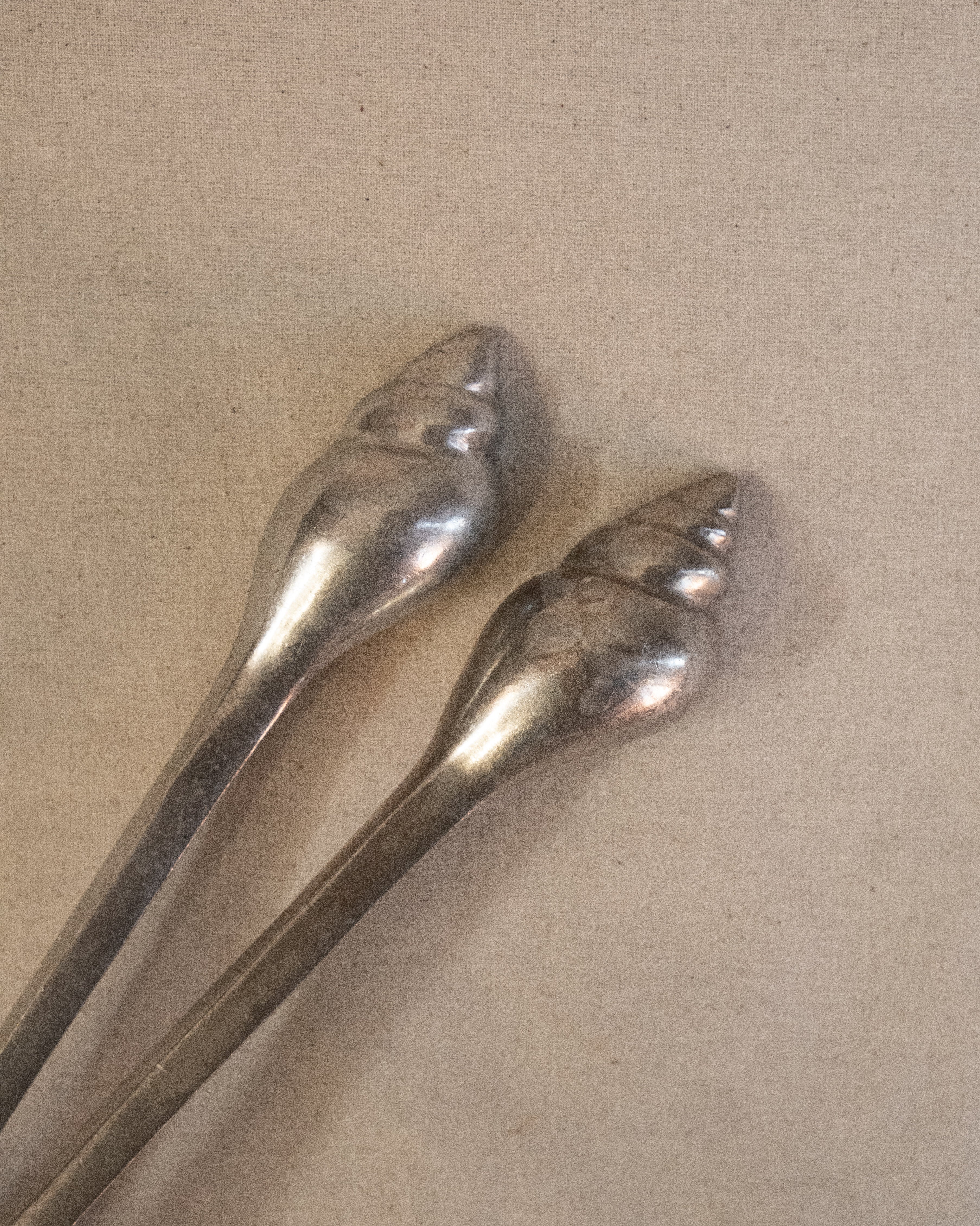 Aluminum salad servers with shell handles