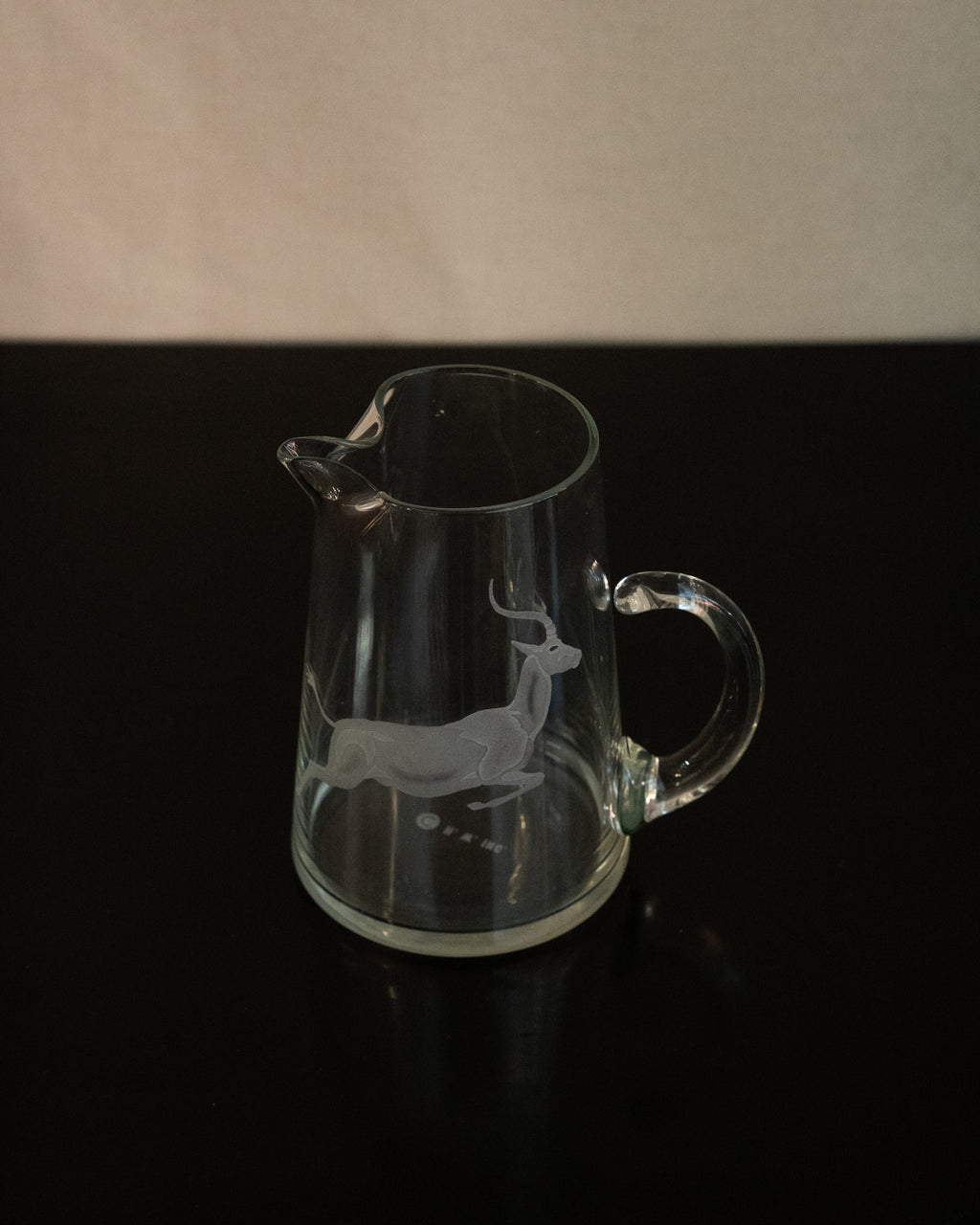 Glass pitcher with etched gazelle