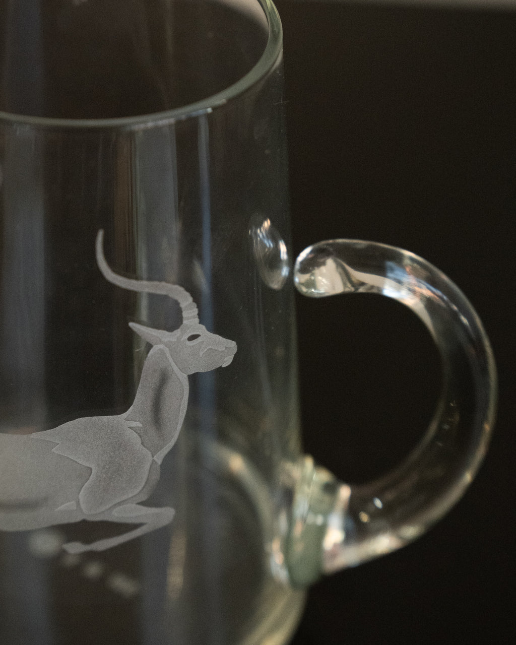Glass pitcher with etched gazelle
