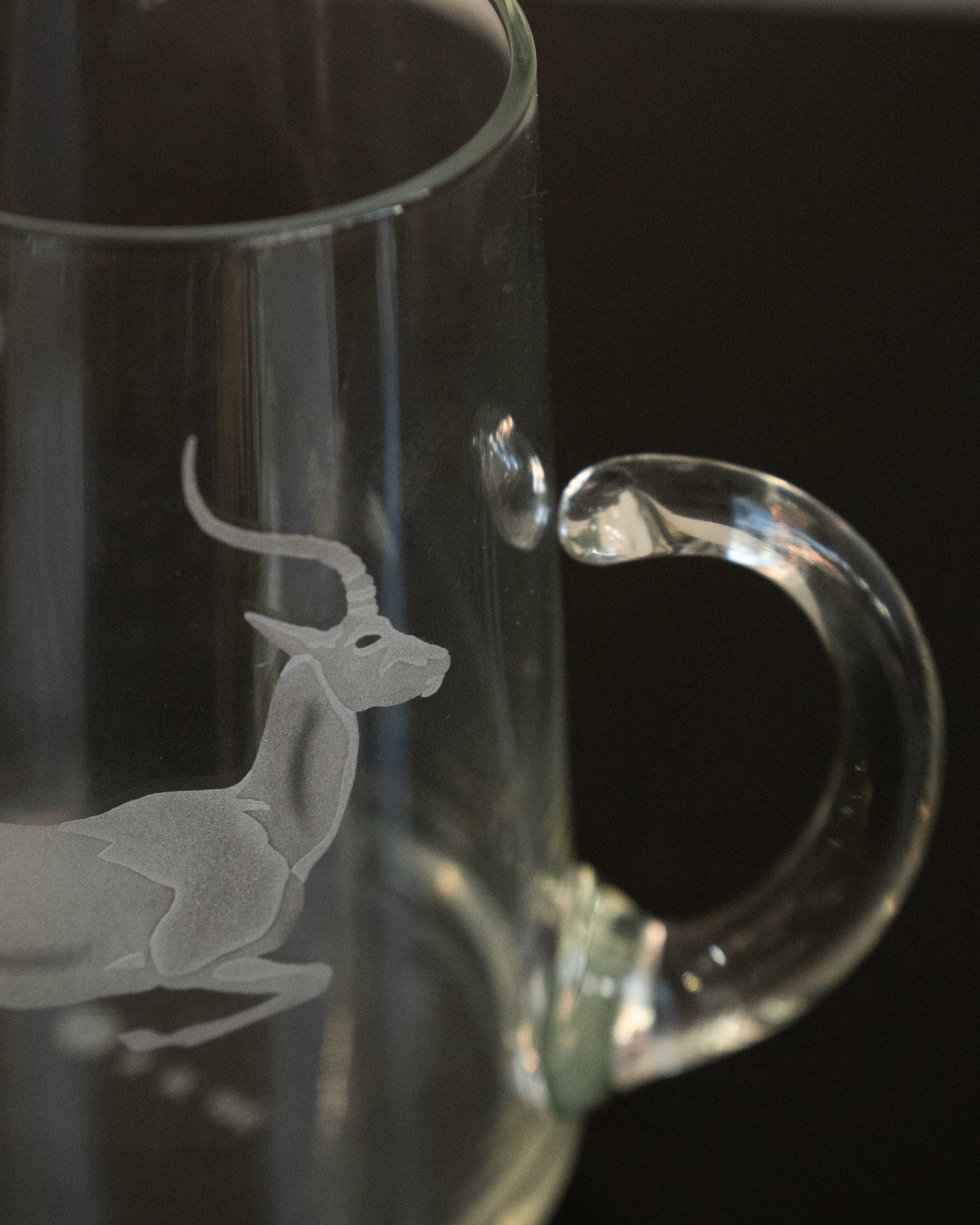 Glass pitcher with etched gazelle