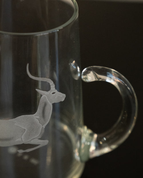 Glass pitcher with etched gazelle