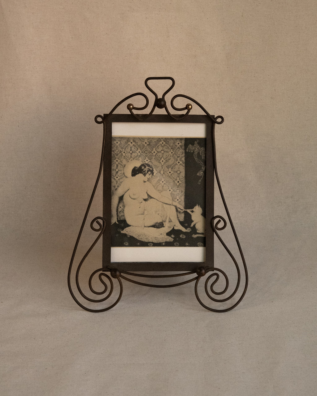 Art nouveau style picture frame with Norman Lindsay photo