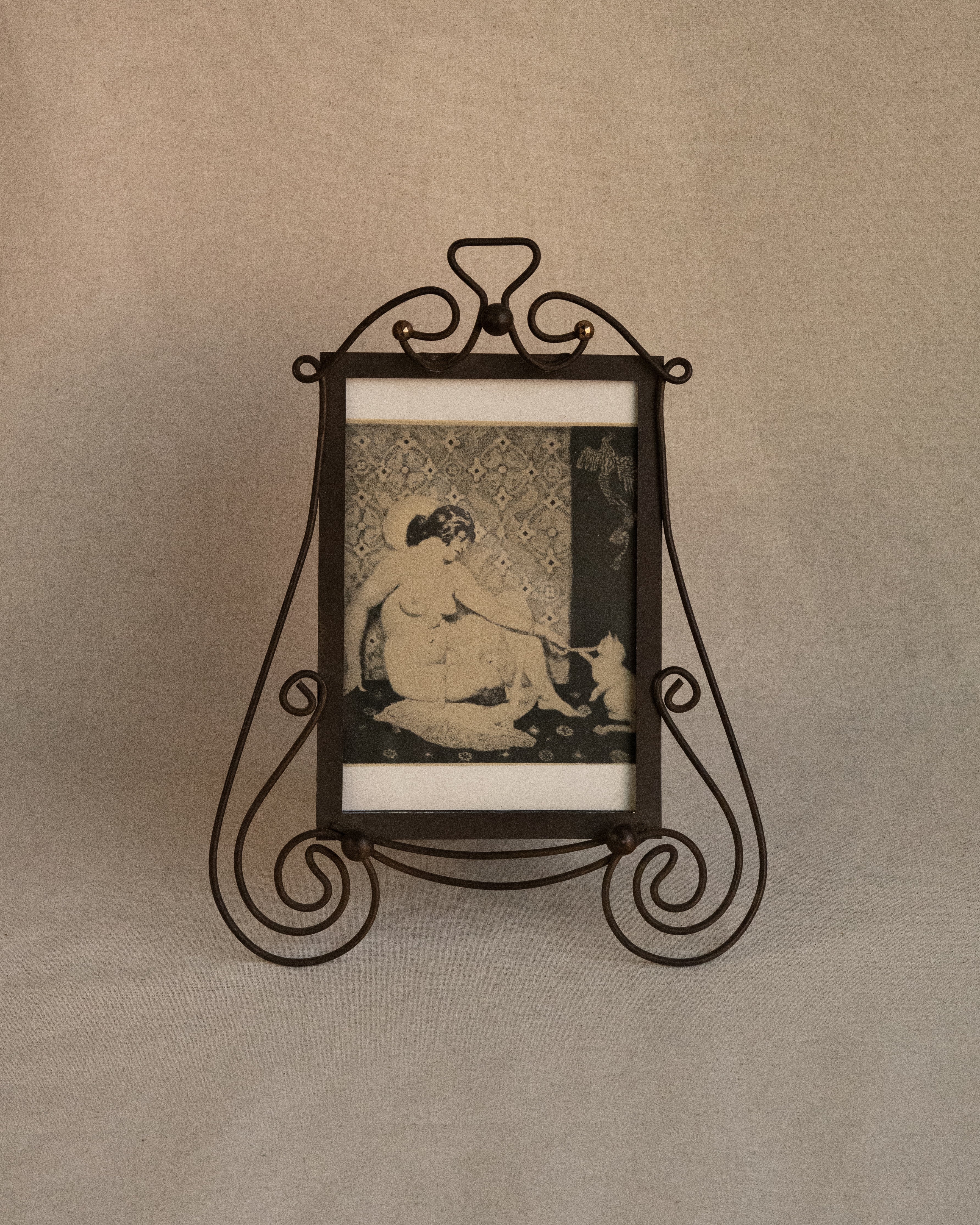 Art nouveau style picture frame with Norman Lindsay photo