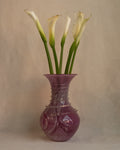 Pink art glass vase with external trailing