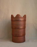 Wavy ceramic planter pot with terracotta finish
