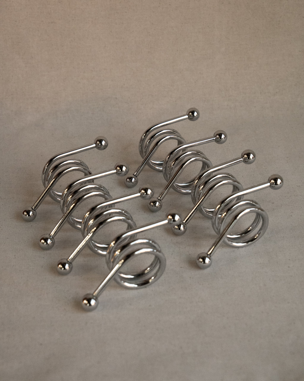 Set of 8 chrome spiral napkin rings