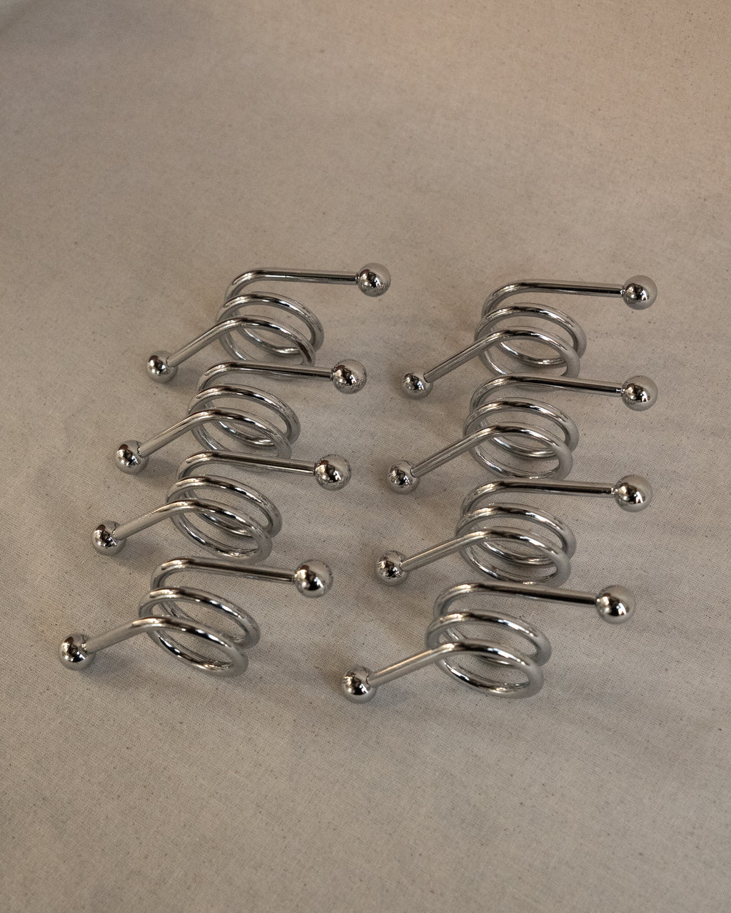 Set of 8 chrome spiral napkin rings