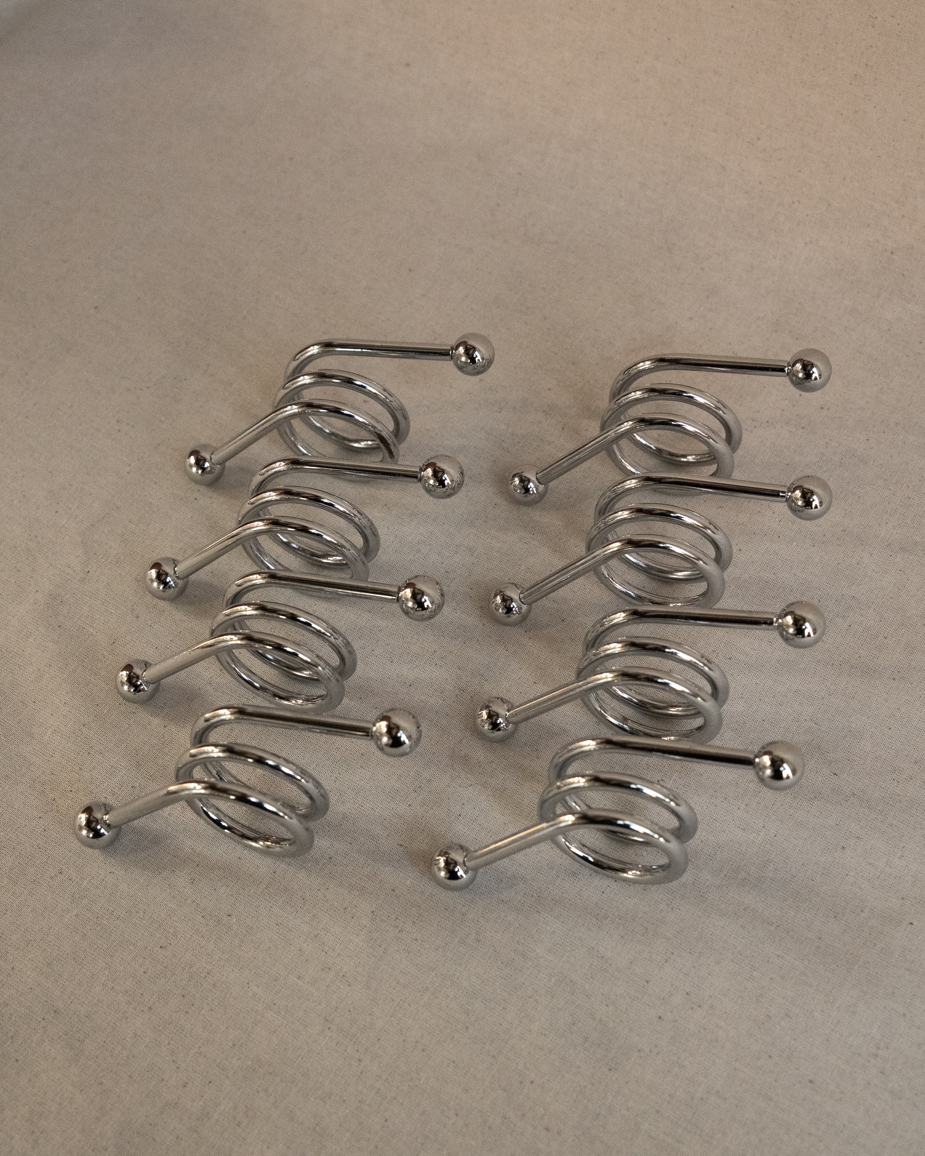 Set of 8 chrome spiral napkin rings