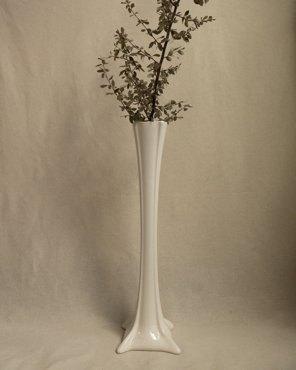 Tall white ceramic vase