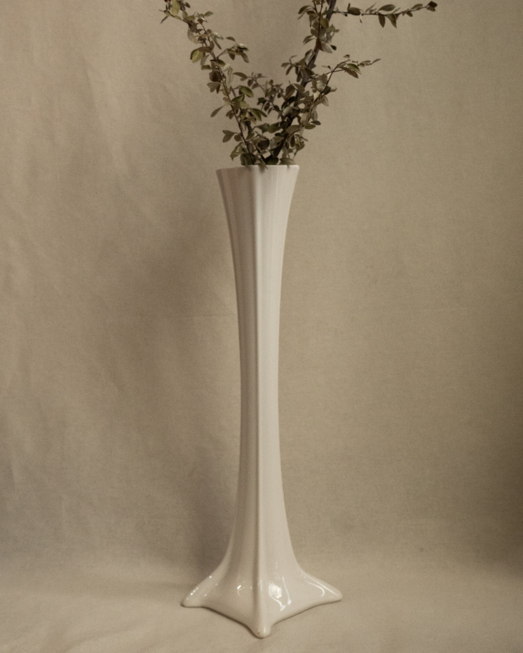 Tall white ceramic vase