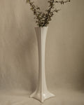 Tall white ceramic vase